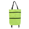 A lime green foldable grocery and shopping cart with black straps.