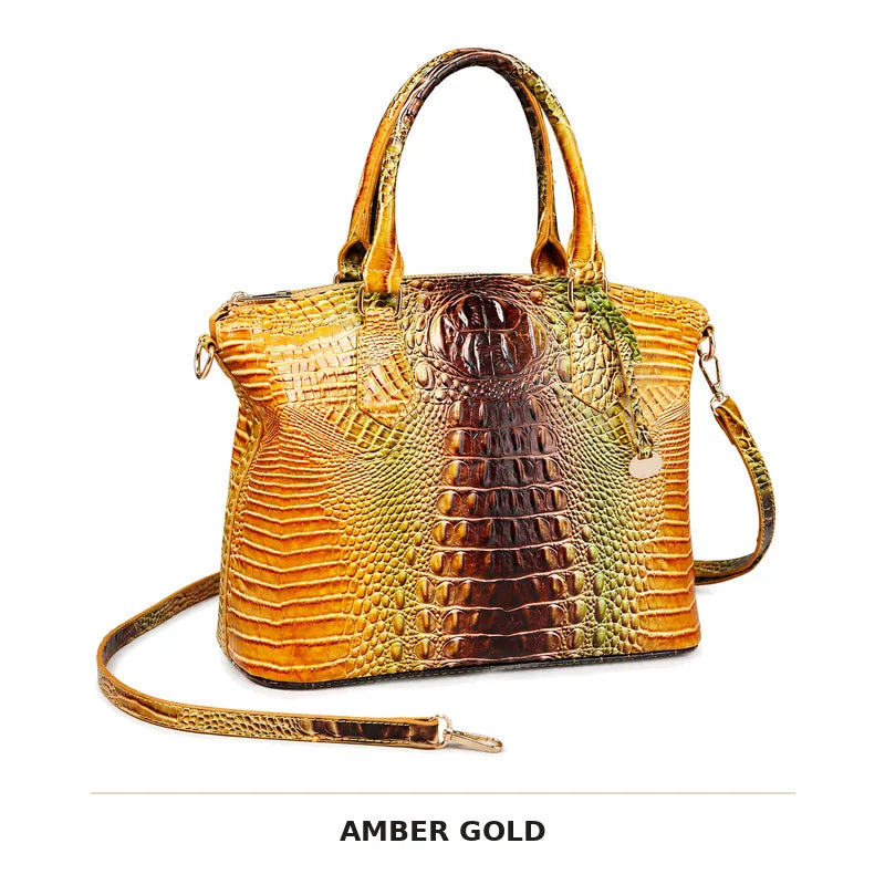 Goldenes, bernsteinfarbenes Alligatormuster-Top mit Henkel und Crossbody-Tasche.