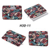 A patterned floral laptop sleeve in pink, green, and black fabric shown from multiple angles.