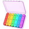 A clear pink weekly pill organizer with compartments labeled for Sun, Mon, Tue, Wed, Thu, Fri, and Sat doses.