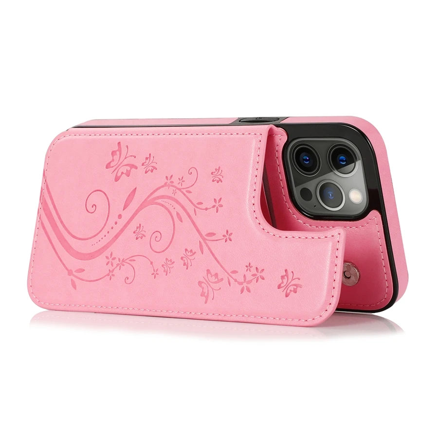 A pink elegant wallet flip case for iPhone showing a floral design.