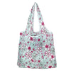 A light blue reusable tote bag featuring a floral pattern of pink and green flowers.