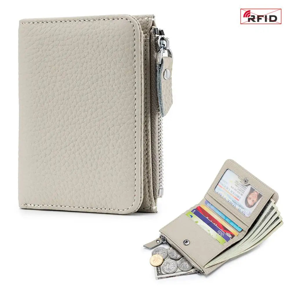 A light beige genuine leather slim bi-fold wallet with a zipper closure and cash slots.