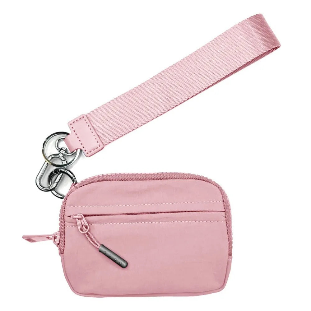A pink multi-functional zipper coin purse wallet with a matching pink strap.