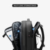 Black heavy duty laptop backpack with vacuum compression features shown from the side.