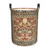 A vintage floral laundry hamper made of fabric with intricate patterns in shades of red, gold, and green.
