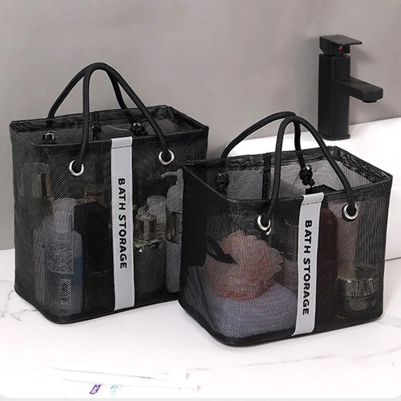 Black mesh shower tote with handles and a strap for storage or travel