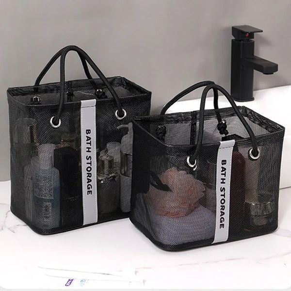 Black mesh shower tote with handles and a strap for storage or travel