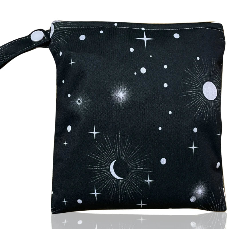 Black reusable waterproof snack bag with a starry night pattern and zipper closure.