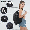A woman is holding a black fashion mesh backpack, highlighting features like a comfortable handle, double zipper, and reflect