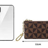 A brown geometric mini coin purse with a gold chain shown next to a smartphone for scale.