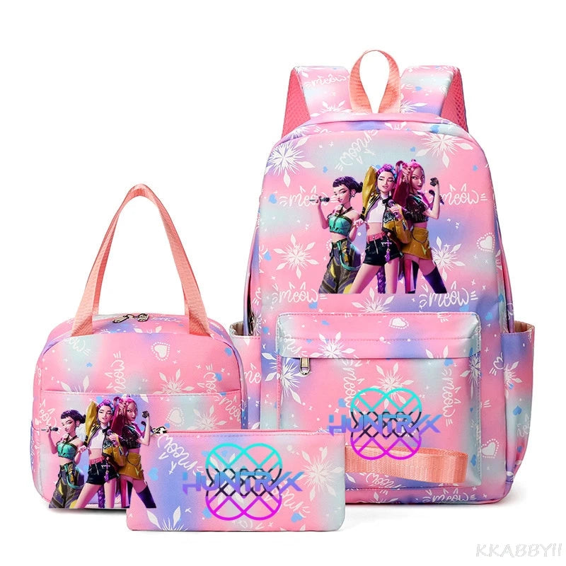 A pink multi-compartment backpack set featuring anime characters and floral patterns.