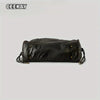 A dark brown vintage washed leather tote bag shown from the side.