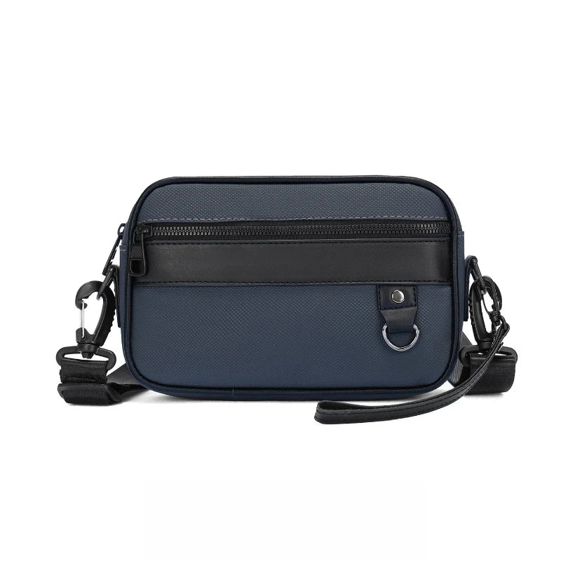 Bolso cruz de cuero PU azul marino con correa ajustable negra.