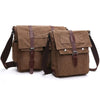 A brown canvas messenger bag for men with leather straps, shown in a flat lay view.