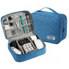 A blue leather cable storage organizer bag containing various electronic accessories and tools.