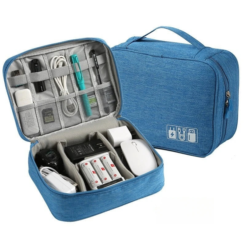 A blue leather cable storage organizer bag containing various electronic accessories and tools.