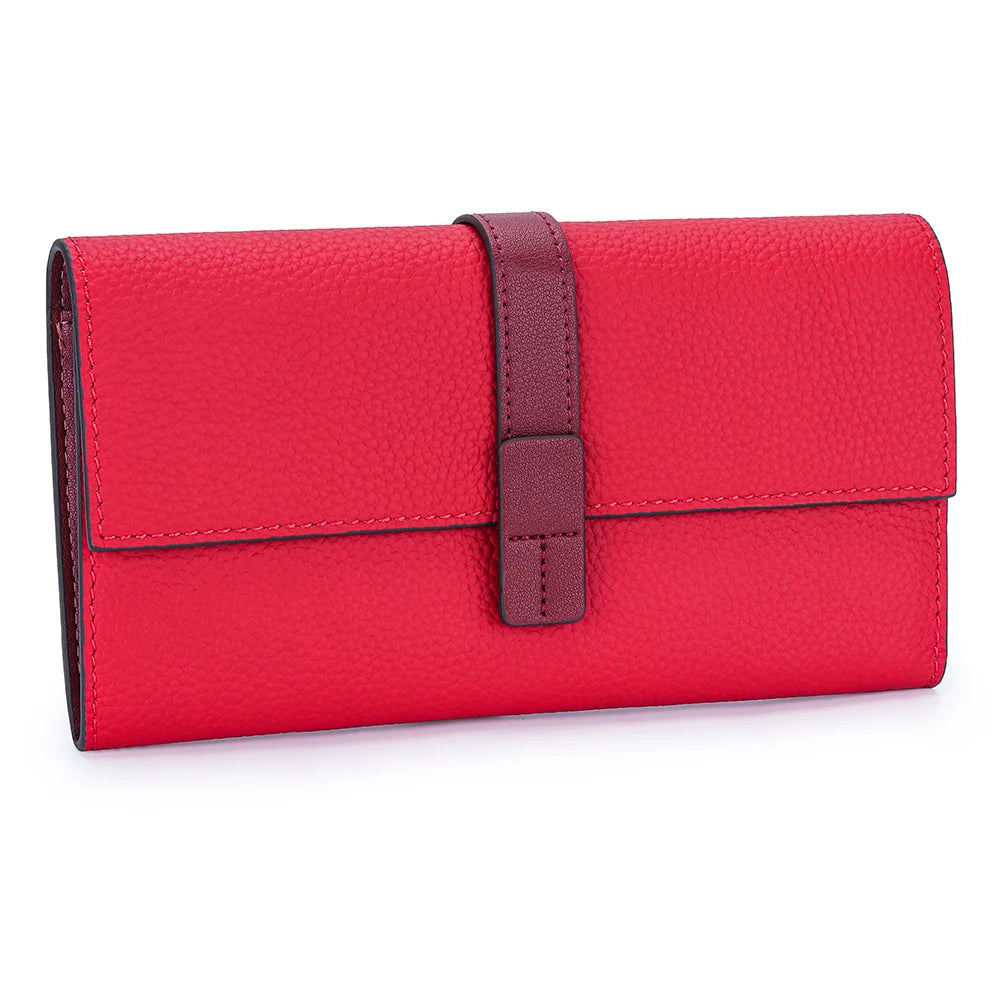 A vibrant red genuine cow leather bi-fold wallet with a leather strap.