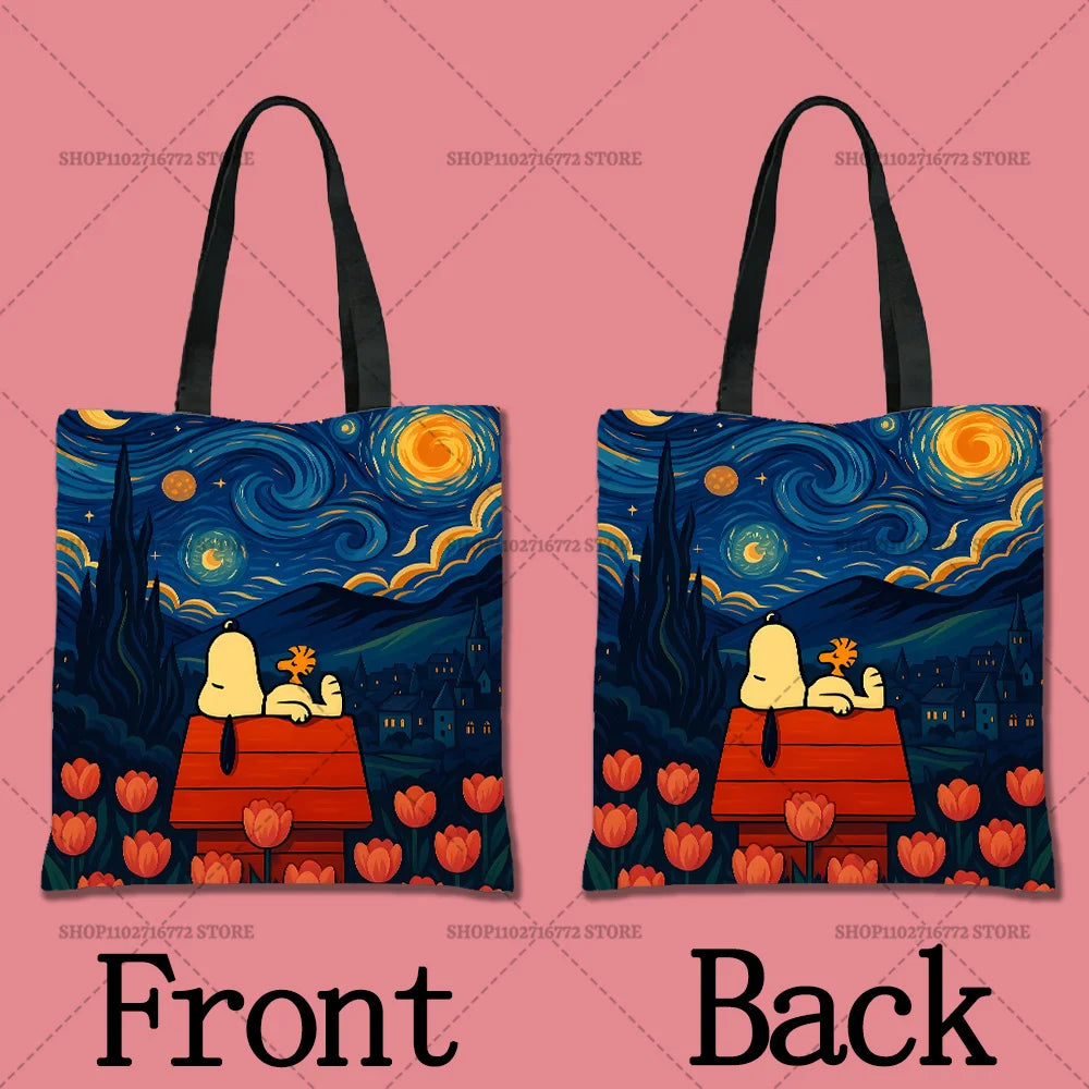 A pair of dark blue cartoon-themed tote bags featuring a night sky and silhouette landscape design.