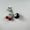 Silver Y2K 8 Ball keychain charm featuring a black ball and three red cherry balls.