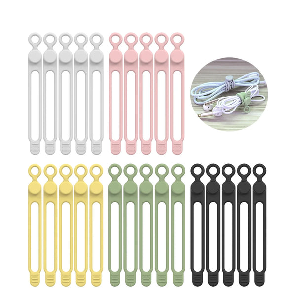 A collection of silicone cable ties and cord organizers in white, pink, and yellow colors.