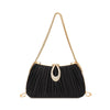 A black pleated evening clutch bag with a gold chain strap and a rhinestone pendant.