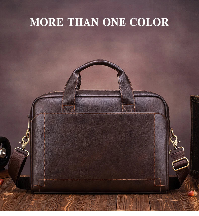 A dark brown genuine leather men's briefcase with leather straps resting on a wooden surface.