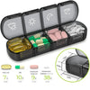 A black weekly pill organizer with 7 compartments for organizing medication doses.