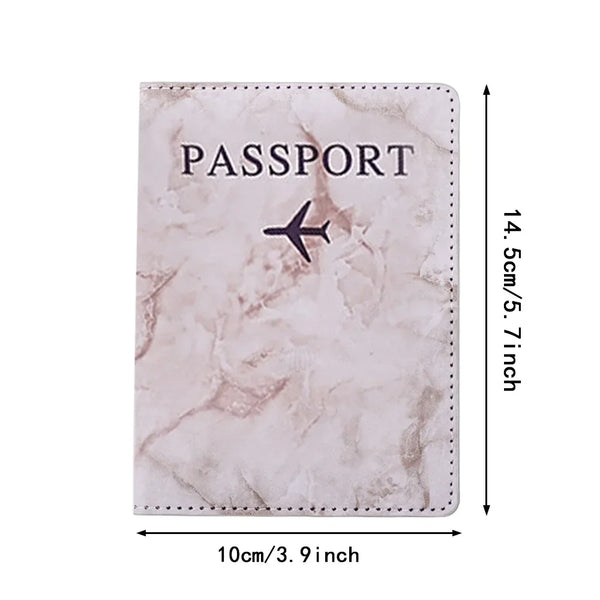 A light pink marbled PU leather passport cover with the word PASSPORT and an airplane icon embossed on it.