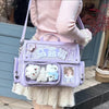 A person is holding a light purple Y2K transparent PU crossbody bag with white fluffy charms and a pink sweater outdoors.