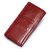 A deep burgundy genuine leather clutch wallet folded and displayed on a white background.