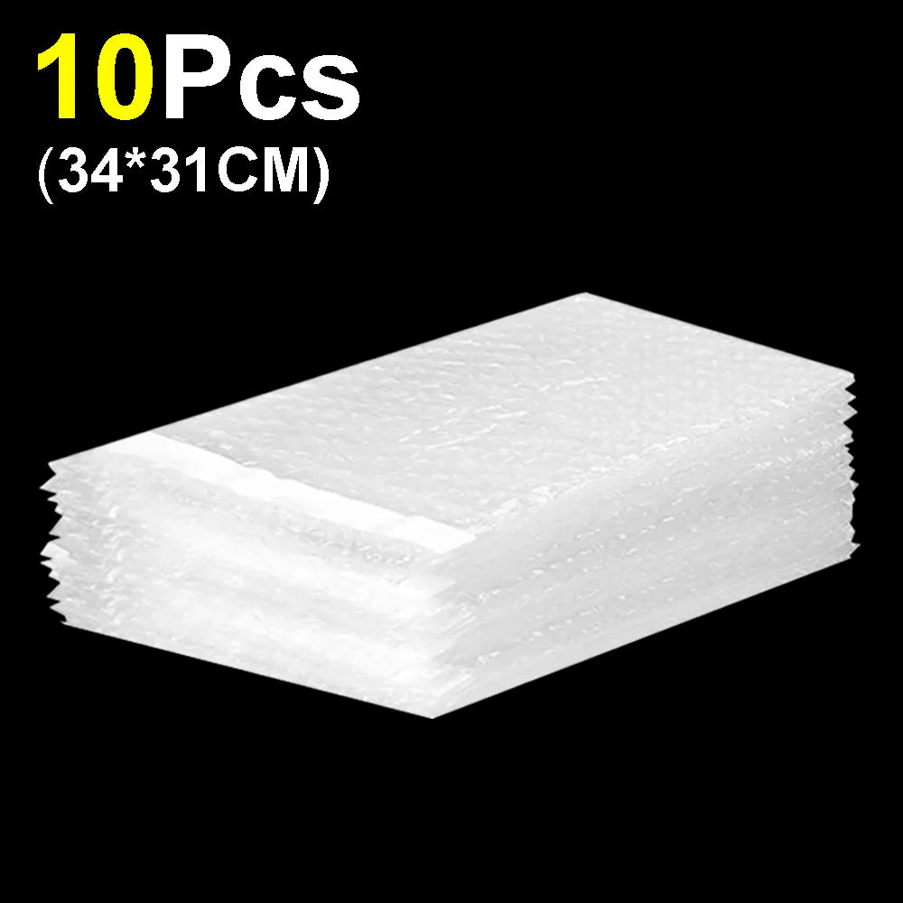 Ten self-sealing bubble mailer bags with protective cushioning stacked together.