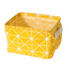A bright yellow waterproof cotton linen storage basket with a white geometric pattern.