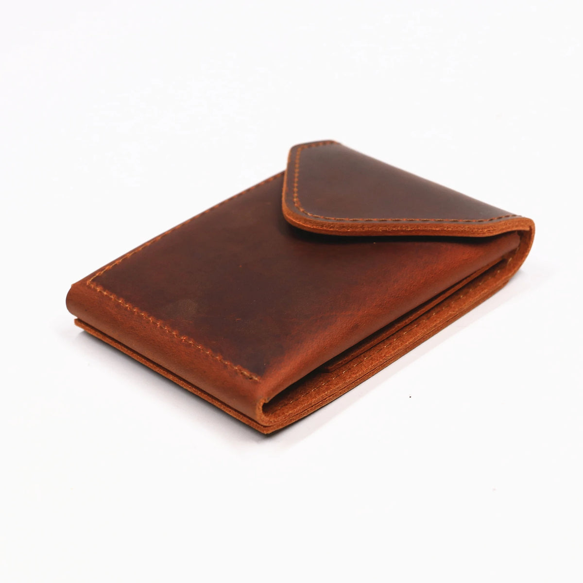 A brown genuine cowhide leather wallet folded and displayed on a white background.
