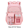 A pink lightweight children's school backpack with plaid accents and a carrying strap.