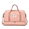 A pink Zuomanni durable nylon travel duffle bag with light quilted texture.