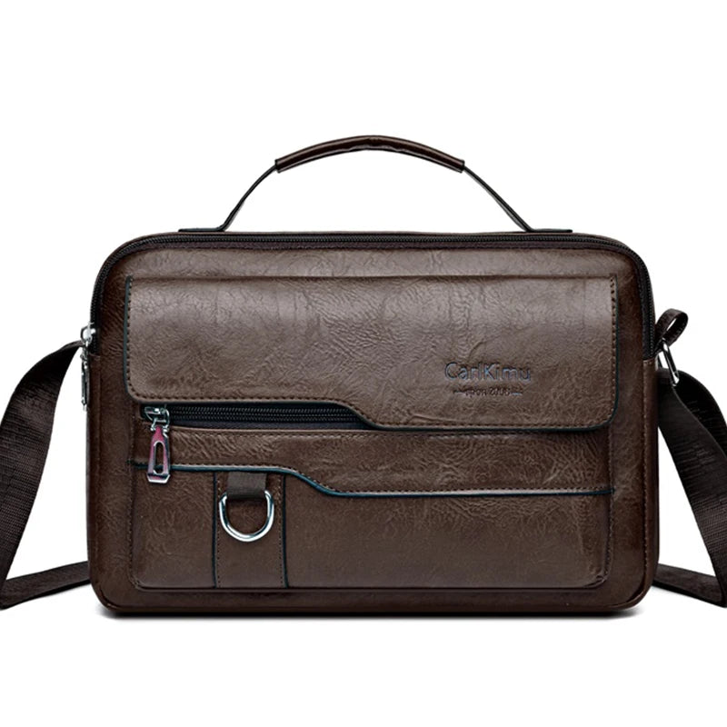 A brown faux leather crossbody bag with a top handle and adjustable strap.