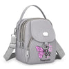 Sac bandoulière floral gris avec fermeture éclair et sangle.