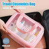 A pink travel cosmetics bag is shown being placed inside a black suitcase, suitable for men and women.
