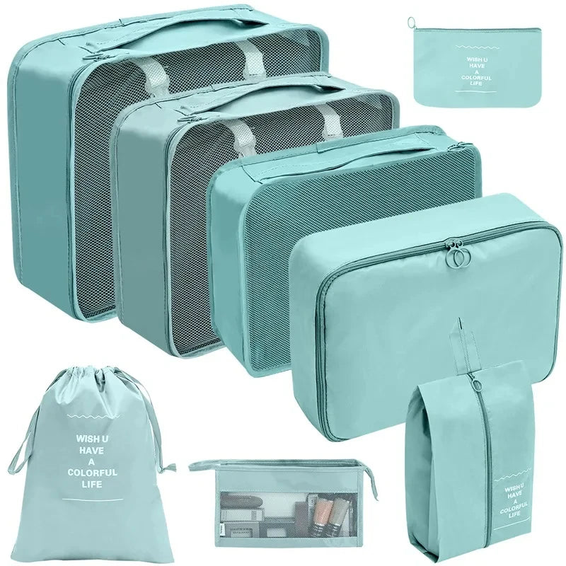 A set of teal fabric storage organizers and a matching drawstring bag for keeping small items.