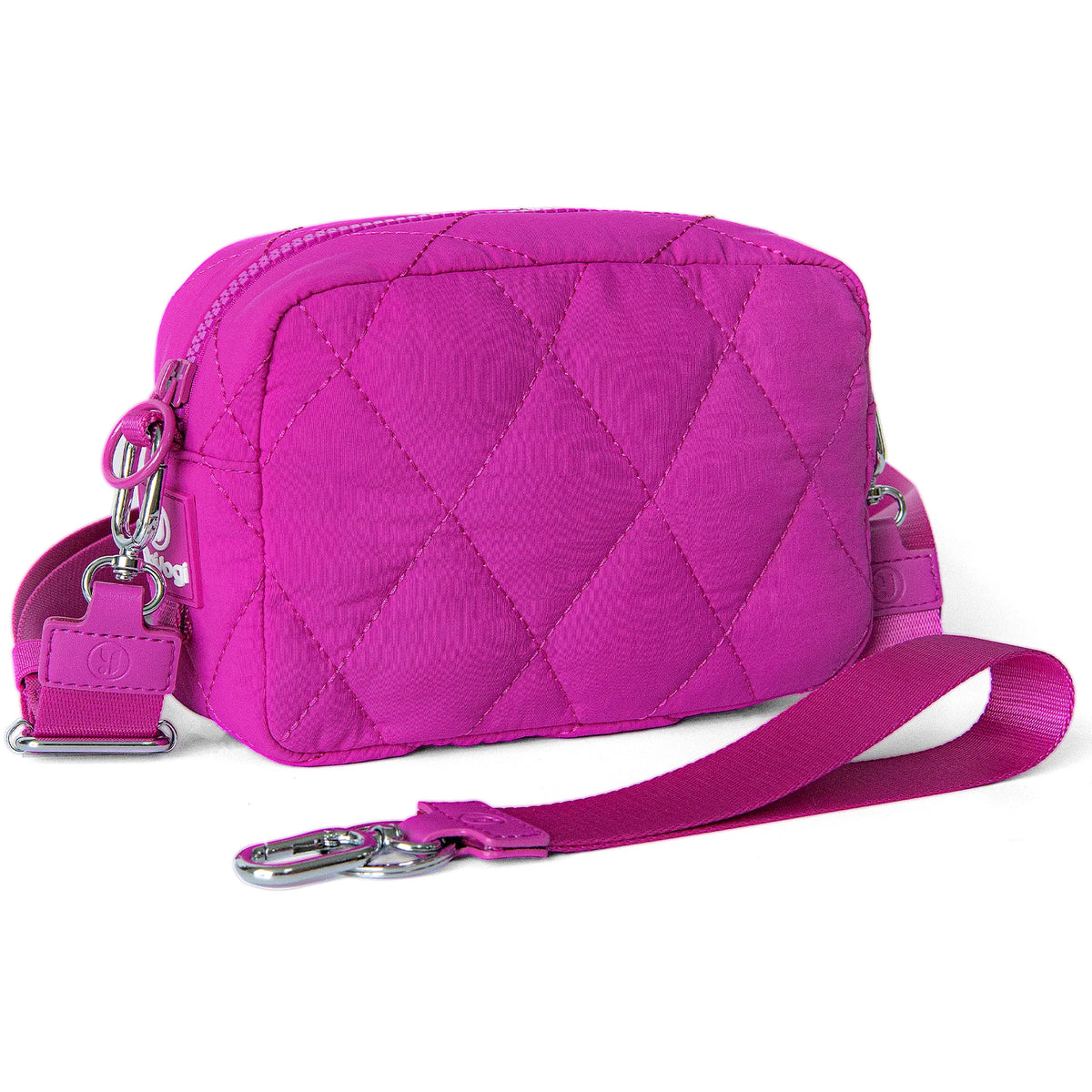 A bright pink quilted nylon wristlet wallet with a silver hardware strap.