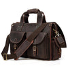 A dark brown genuine cowhide leather briefcase with padded compartments and leather straps.