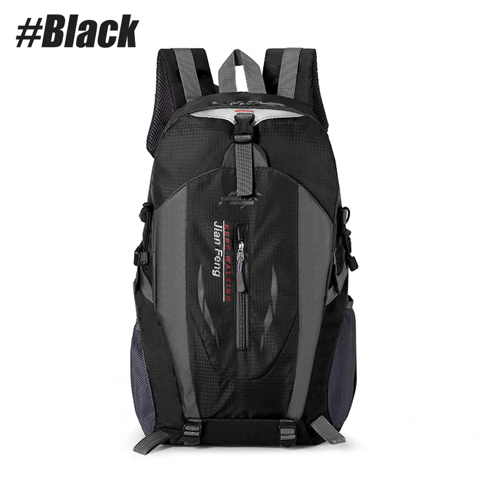 Black waterproof hiking backpack with gray accents and adjustable straps.