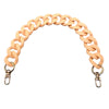 A light peach acrylic chunky chain shoulder strap for a handbag.