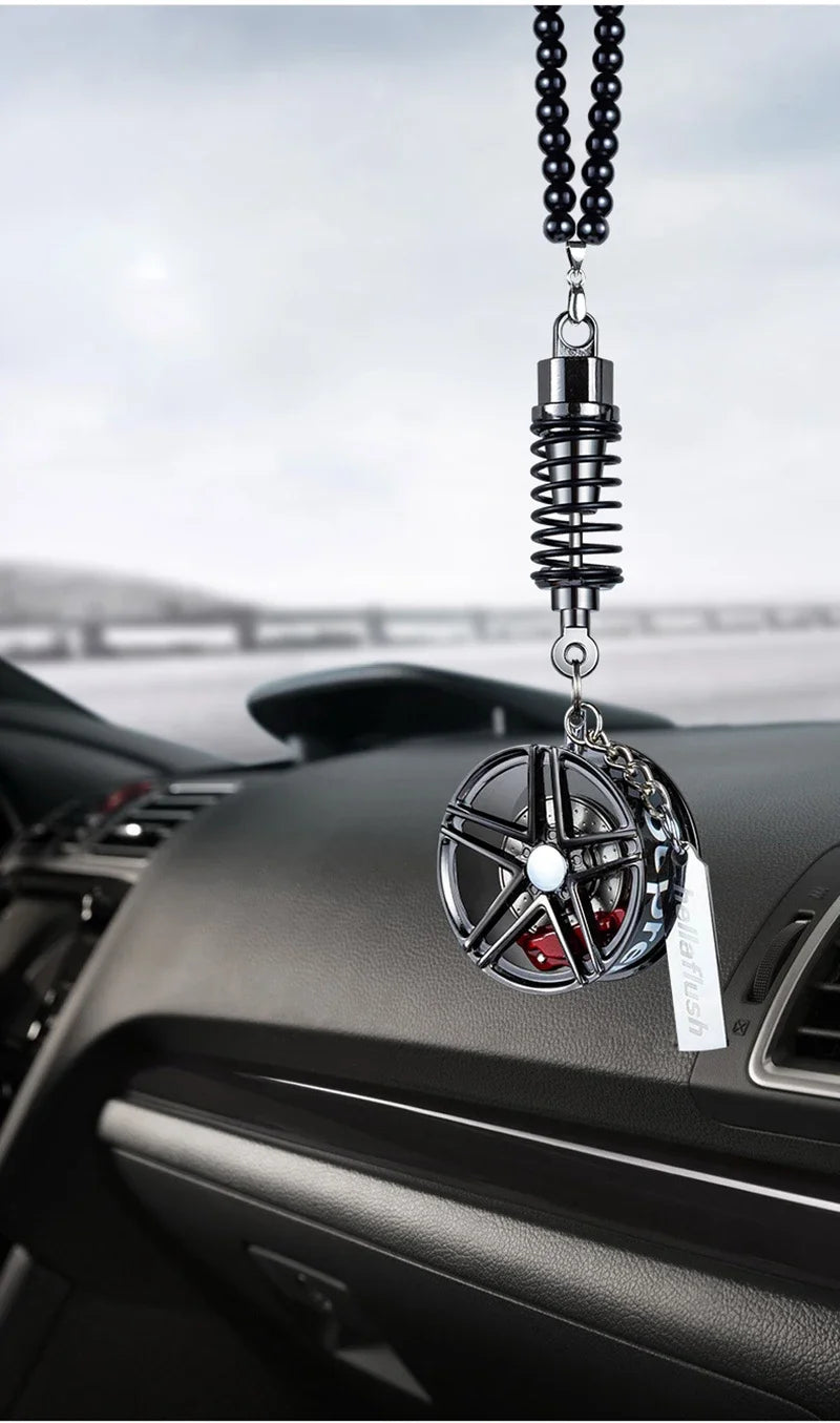 Black alloy wheel hub brake disc rearview mirror pendant hanging from a chain