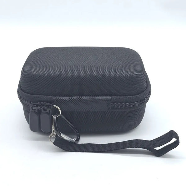 Black durable hard shell case for digital cameras with a black strap.