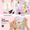 Hand holding a clear poly mailer with a thank you design, showing its tear resistance and waterproof quality.