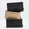 A set of three felt bag organizer inserts in black and beige colors.