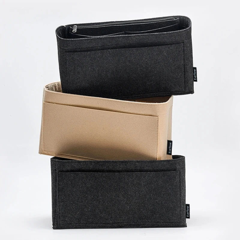 A set of three felt bag organizer inserts in black and beige colors.