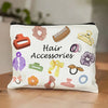 A white zippered pouch filled with various hair accessories like combs, clips, and scrunchies.